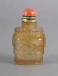 A Chinese Carved Agate Snuff Bottle