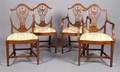 A Set of Eight Hepplewhite Carved Mahogany Dining Chairs