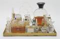 A Collection of Eighteen Perfume Bottles