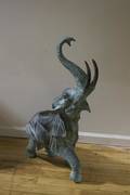 A Cast Metal Figure of an Elephant