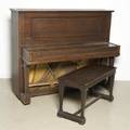 A Steinway  Sons Upright Piano