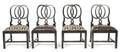A Set of Four Ebonized Side Chairs