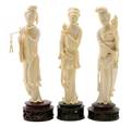 A Group of Three Carved Ivory Figures