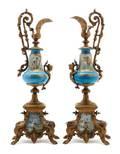 A Pair of Sevres Style Gilt Metal Mounted Ewers