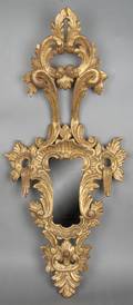 An Italian Rococo Style Carved Giltwood Mirror