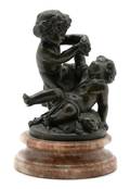 A Bronze Figure Depicting Satyr and Putto at Play After Clodion