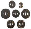 A Group of Seven Iron Tsuba
