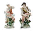 A Pair of Chelsea Style Porcelain Figural Groups