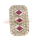 An 18 Karat White Gold Ruby and Diamond Ring