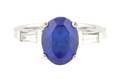 A 14 Karat White Gold Tanzanite and Diamond Ring