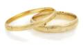 A Group of Two 14 Karat Yellow Gold Hinged Bangle Bracelets