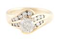 A 14 Karat Yellow Gold and Diamond Ring