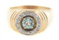 A 14 Karat Yellow Gold Aquamarine and Diamond Ring