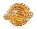 An 18 Karat Yellow Gold Citrine and Spessartite Garnet Ring