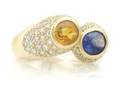 A 14 Karat Yellow Gold Blue Sapphire Yellow Sapphire and Diamond Ring