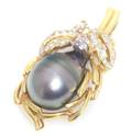 An 18 Karat Yellow Gold Black Tahitian Cultured Pearl and Diamond Pendant