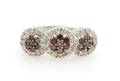 A 14 Karat White Gold Irradiated Brownish Red and White Diamond Ring