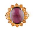 A 14 Karat Yellow Gold Rhodolite Garnet and Spessartite Garnet Ring