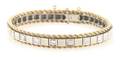 A 14 Karat Yellow Gold and Diamond Bracelet