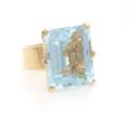 An 18 Karat Yellow Gold and Aquamarine Ring