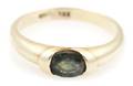 A 14 Karat Yellow Gold and Green Sapphire Ring