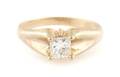 A 14 Karat Yellow Gold and Diamond Ring
