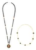 A Group of Two 14 Karat Yellow Gold and Onyx Necklaces