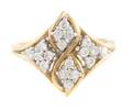 An 18 Karat Yellow Gold and Diamond Ring