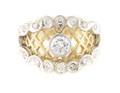 An 18 Karat Yellow and White Gold and Diamond Ring