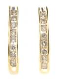 A Pair of 14 Karat Yellow Gold and Diamond Earrings