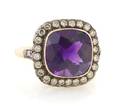 An 18 Karat Yellow Gold Amethyst and Diamond Ring