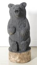 A Carved Wood Figure of a Bear