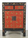 A Chinese Red and Black Lacquered Cabinet