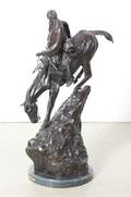 A Bronze Figural Group After Frederic Remington