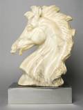 A Carved Stone Bust of a Horse