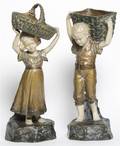 A Pair of Austrian Earthenware Figural Jardinieres
