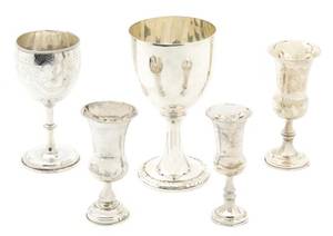 A Collection of Five English Silver Goblets