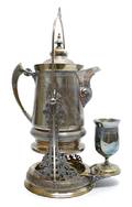 A Silverplate Hot Water Kettle on Stand