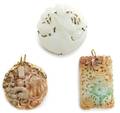A Collection of Three Chinese Jade Toggles