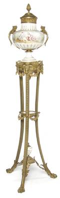 A Sevres Style Gilt Metal Mounted Urn on Stand