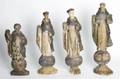 A Group of Four Carved Wood and Painted Santos Figures