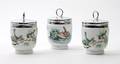 A Set of TwentyOne English Porcelain Egg Coddlers Royal Worchester