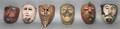 A Collection of Eight Carved Mexican Masks