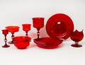 SIXTYFOUR PIECE MURANO RUBY RED GLASS TABLE SERVICE