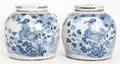 A Pair of Blue and White Handpainted Ginger Jars and Lids