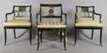 A Pair of Regency Style Painted and Parcel Gilt Arm Chairs