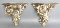A Pair of Italian Silvered Wood Brackets