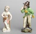 A Group of Two Continental Porcelain Figures
