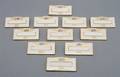 A Group of Eleven Dresden Place Card Holders