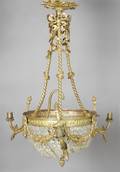 A French Gilt Metal and Cut Crystal ThreeLight Chandelier